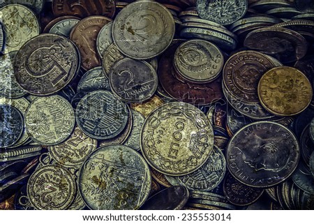 Old coins of different Nationalities, from different periods. Image digitally manipulated as one old photo.