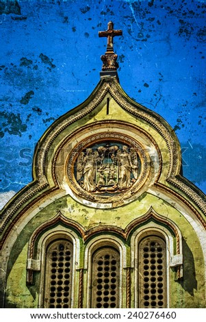 Architectural details on a historic serbian church in Union Square, Timisoara, Romania. Image digitally manipulated as one old photo.