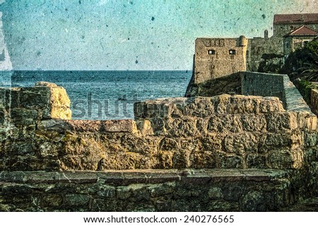 Old photos with fortress of the old town of Budva, Montenegro. Image digitally manipulated in the form of old photos.
