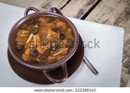 Traditional Russian meat soup with salty cucumbers