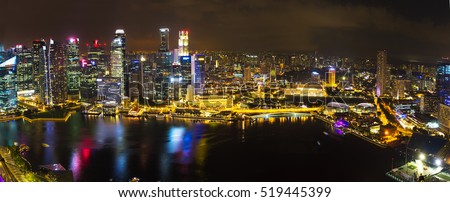 Landscape of the Singapore financial district and business building in evening lights from sands SkyPark observation deck