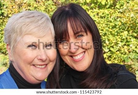 Stunning portrait of a beautiful elderly mother and her daughter
