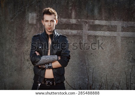 Rock fashion man in black clothes