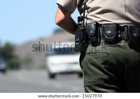 A police officer watching traffic