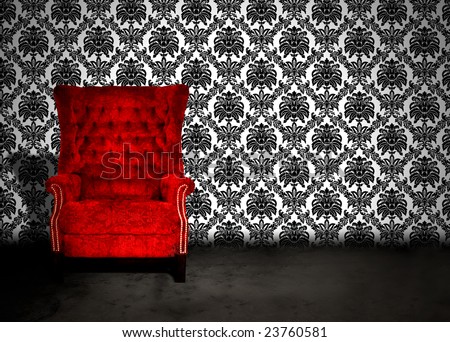 A red velvet chair in a dark room with antique wallpaper