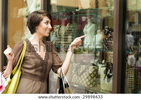 Happy woman shopping at an outdoor mall