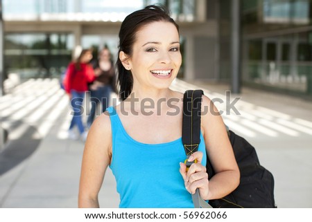 Young college student standing outside