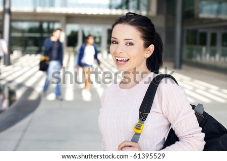 Young college student standing outside