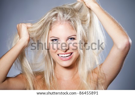 Beautiful woman having a bad hair day
