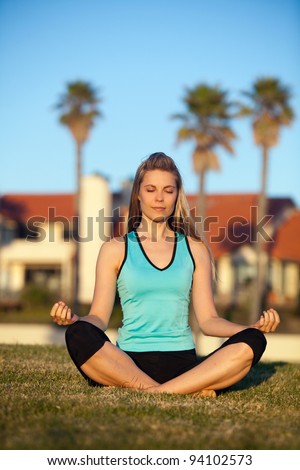 Young woman exercising in the park