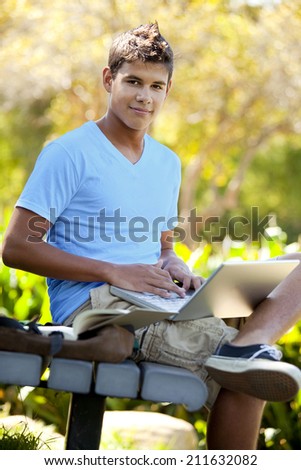 Student with backpack studying outside