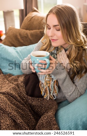 Young woman with a large mug of tea