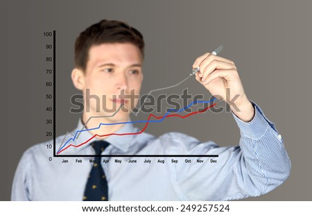 Man drawing a line graph - focus on graph