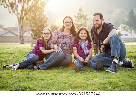Happy family spending time in the park