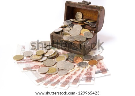 Wooden chest of money, isolated over white background