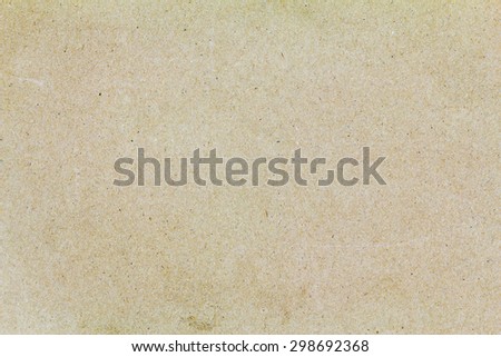 brown cardboard texture closeup, natural rough textured paper background