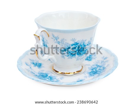 Antique porcelain tea cup & saucers with floral painting on white background
