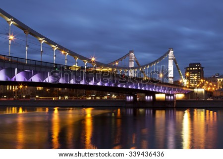 Krymsky Bridge or Crimean Bridge at night is a steel suspension bridge in Moscow, Russia.