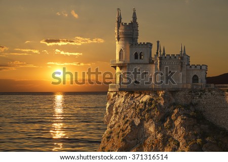 Swallow\'s Nest castle on the rock over the Black Sea on the sunset. Gaspra. Crimea, Russia