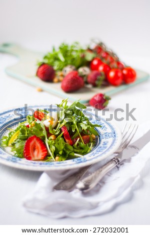 summer salad with strawberries and tomatoes