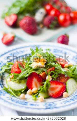 summer salad with strawberries and tomatoes