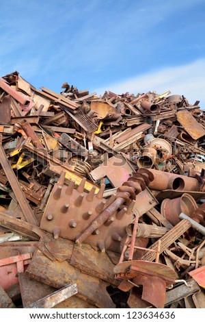 Heap of metal for recycling with blue sky