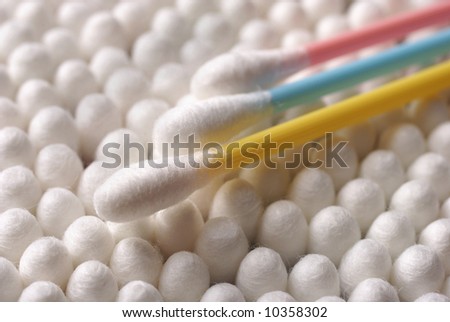 Heap of white cotton sticks in close up