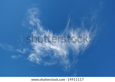 Beautiful, interesting shape of white clouds on blue sky