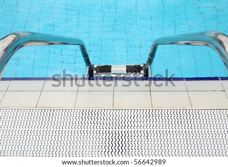 Detail from open air olympic swimming pool - steel ladder