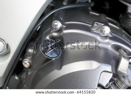 Close up of an oil filler cap on modern motorcycle