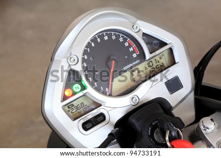 Close up photo of modern motorcycle dashboard
