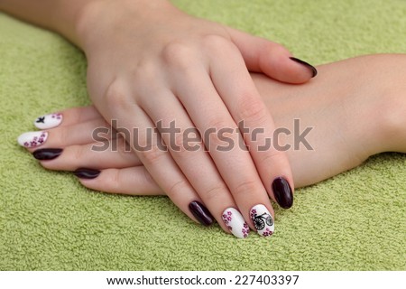 Finger nail treatment ,hands with painted fingernails