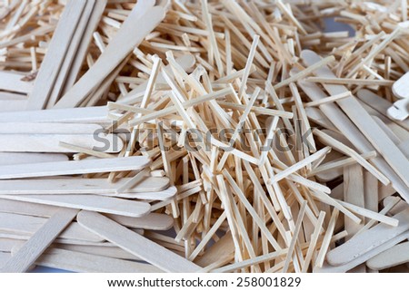 Bunch of wooden sticks and ice cream sticks