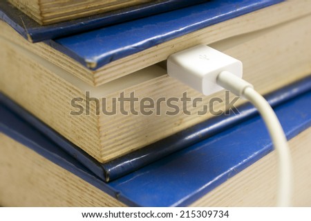 blue book and usb cable fragment of information technology