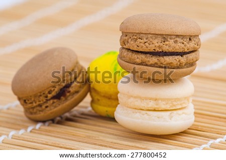 Colorful macarons on a bamboo floor