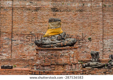 Antique Buddha statue without head in Ayutthaya Historical Park.Public place.Thailand
