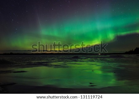 A reflection of northern light at the ice