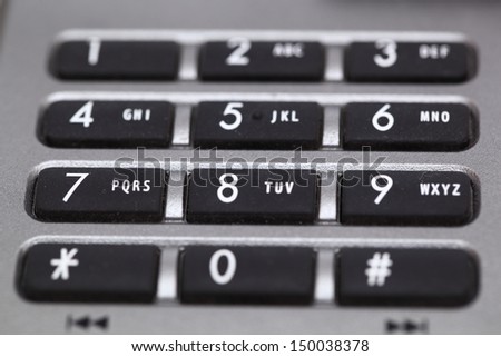 on a photo gray phone keypad