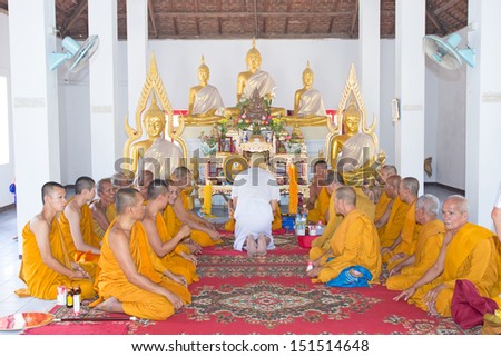 BANGKOK,THAILAND March 03 : Newly ordained Buddhist monk pray with priest procession .Newly ordained Buddhist monks have a ritual in the temple procession in Bangkok Thailand on March 03, 2013