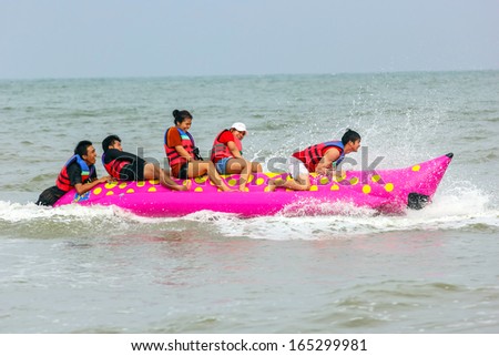Pattaya - November 16 : Tourists Enjoying Ride A Banana Boat Adventure On November 16, 2013 In Pattaya Beach,Thailand