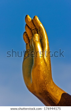 gentle golden hand Buddha