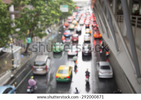 Blurred photo of  traffic jam in rainy day. Bangkok Thailand.