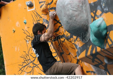 SANTIAGO, CHILE - DECEMBER 4: A contestant climbs the wall of Lippi 9th Boulder, wall climbing competition on December 4, 2009 in Santiago, Chile.