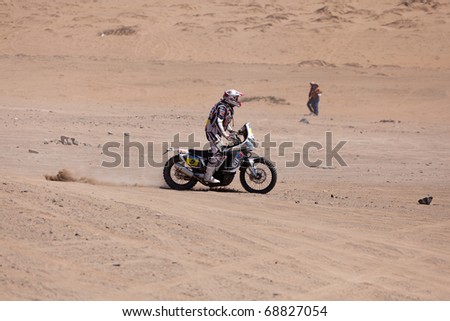 COPIAPO - JANUARY 11: David Casteu from France riding his bike during his participation on Rally Dakar 2011 Argentina Chile, January 11 in Copiapo Chile.