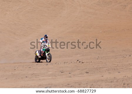 COPIAPO - JANUARY 11: Francisco Lopez Contardo from Chile riding his bike during his participation on Rally Dakar 2011 Argentina Chile, January 11 in Copiapo Chile.
