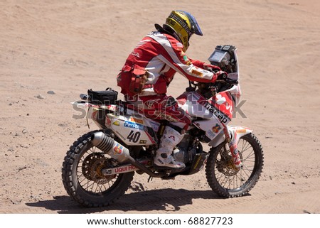 COPIAPO - JANUARY 11: Felipe Phohens from Chile riding his bike during his participation on Rally Dakar 2011 Argentina Chile, January 11 in Copiapo Chile.