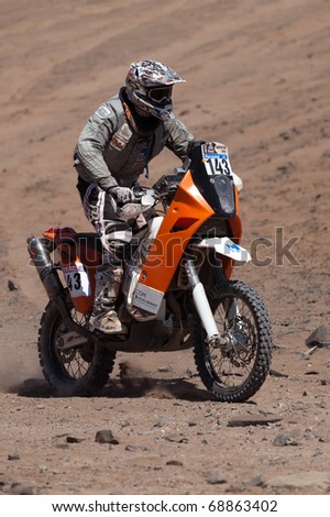 COPIAPO - JANUARY 11: Daniel Schoroder Guell from Germany  driving his bike during his participation on Rally Dakar 2011 Argentina Chile, January 11, 2011  in Copiapo Chile.