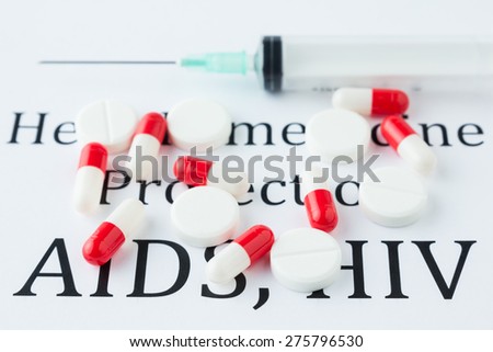 Syringe and Pills on Aids, Hiv