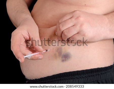 Insulin injection in a belly. Skin with post-injection hematoma.