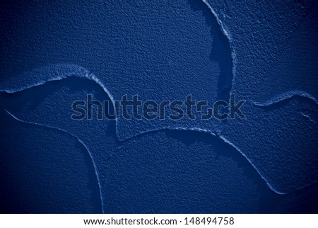 Dark blue indoor structural plaster background or texture